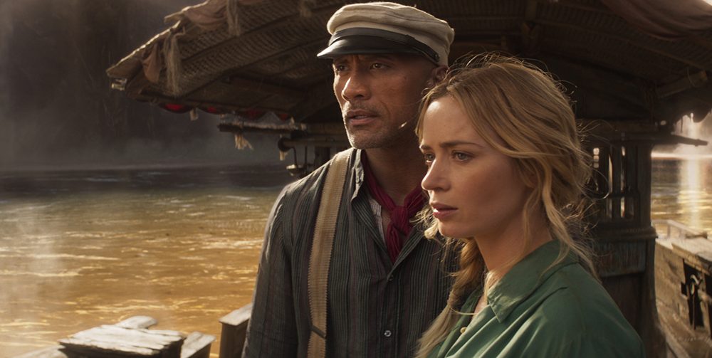 A scene with Dwayne Johnson and Emily Blunt on a boat in the Amazon from the film Jungle Cruise.
