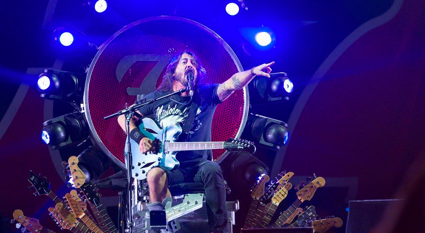 Dave Grohl performing on stage.