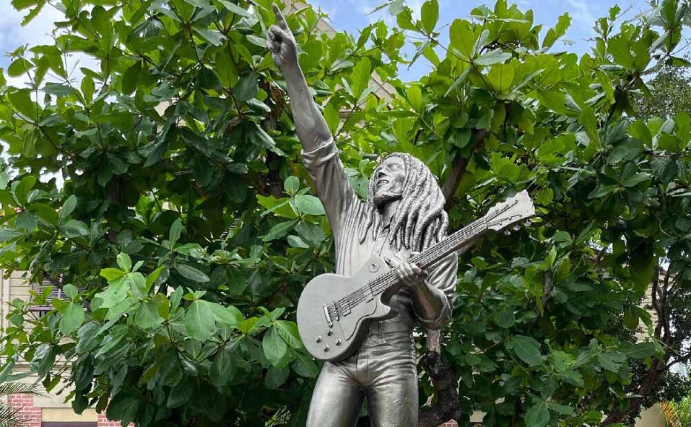 Bob Marley statue greets visitors at Bob Marley Museum.