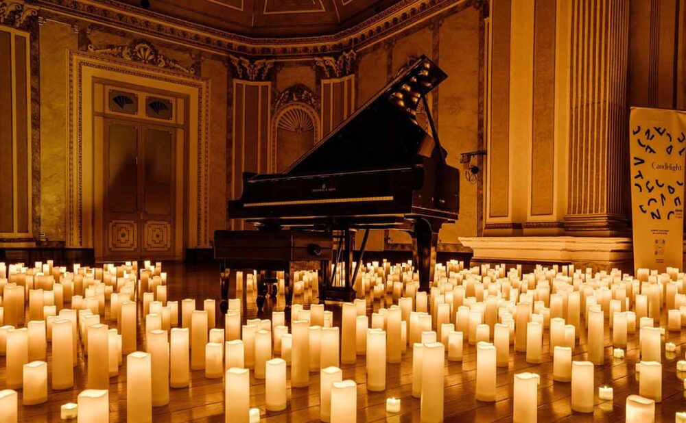 Piano surrounded by candles