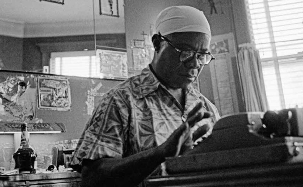 Louis Armstrong using typwriter