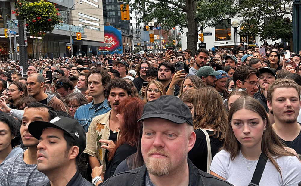 Thousands of NIckelback fans met a barrier that created huge gap Friday night at the free TIFF concert between music lovers and the band — as well as crowd safety concerns.