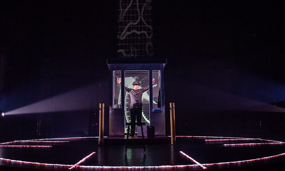 Walter Borden in The Last Epistle of Tightrope Time, from the Neptune Theatre production. Set, lighting, costume, projection design by Andy Moro. © Stoo Metz.