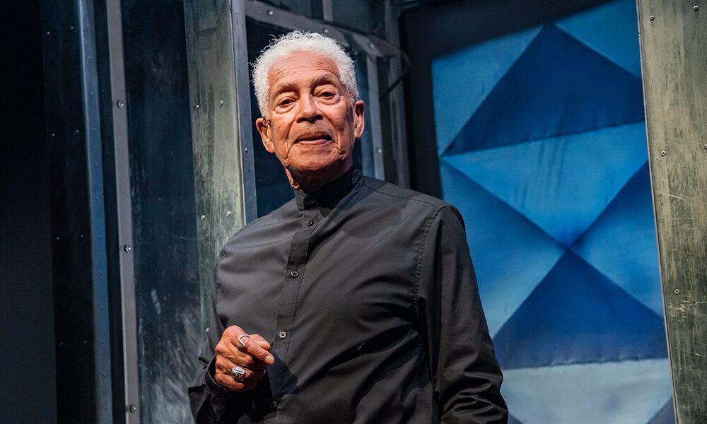 Walter Borden in The Last Epistle of Tightrope Time, from the Neptune Theatre production. Set, lighting, costume, projection design by Andy Moro. © Stoo Metz.