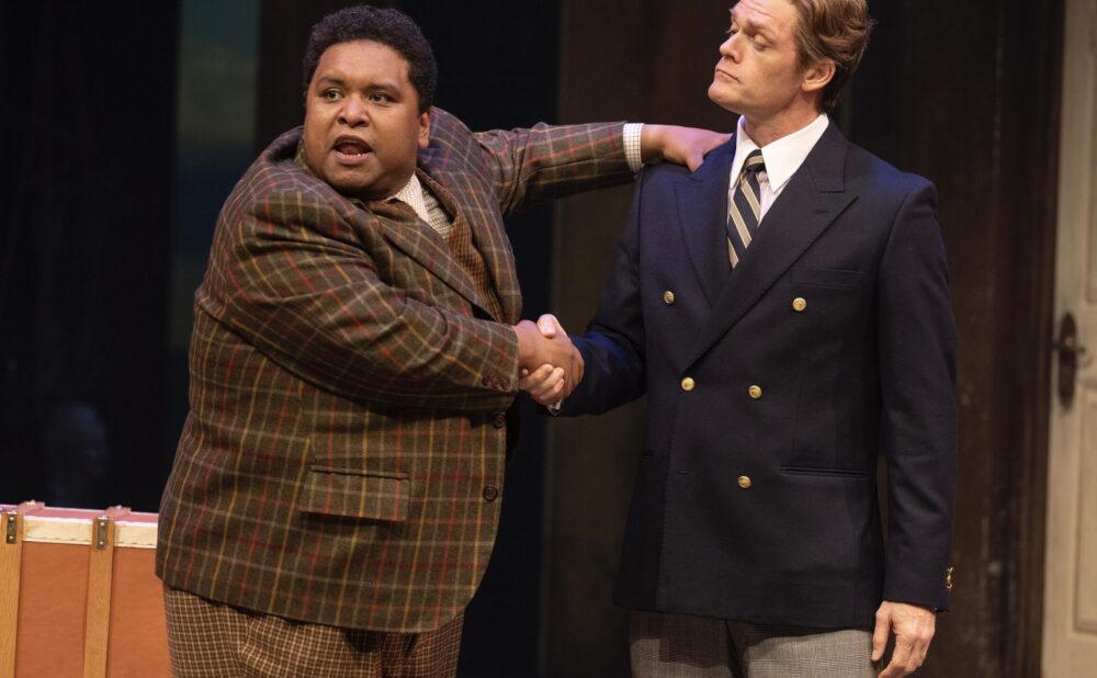 Peter Fernandes as Francis Henshall and Martin Happer as Stanley Stubbers in One Man, Two Guvnors (Shaw Festival, 2024). Photo by David Cooper.